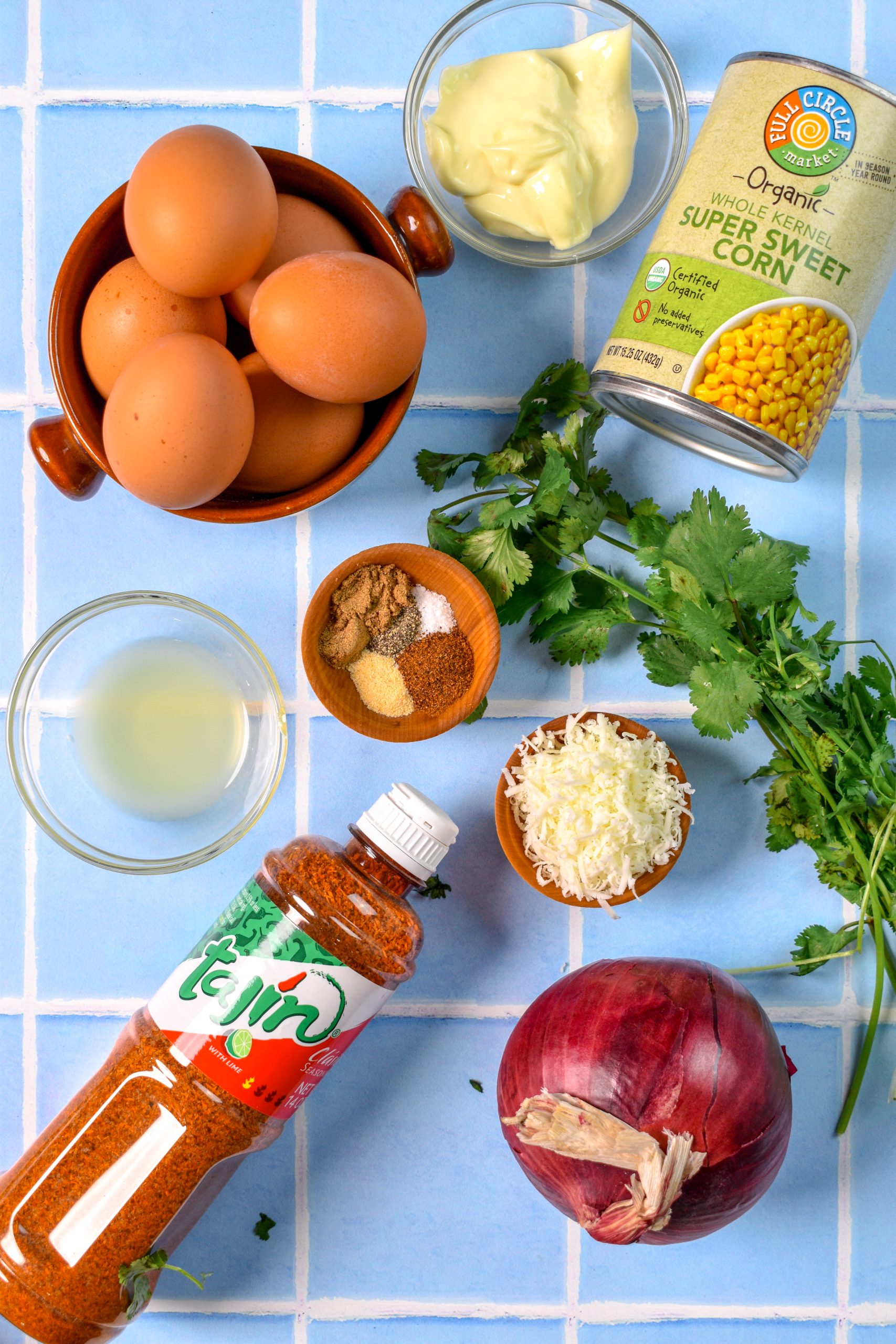 This in an image of the ingredients needed to make elote deviled eggs